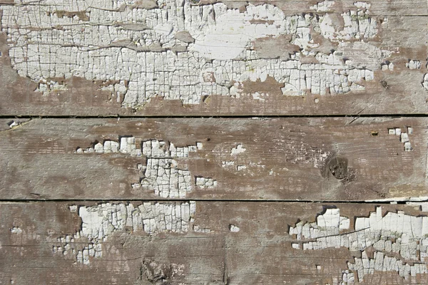 ひびの入った塗装で古い木製の背景 — ストック写真
