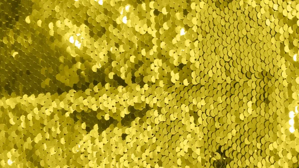 Yellow glitter sparkles textile. Abstract shiny pattern. — Stock Photo, Image