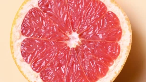 Lassú mozgás és méretezés zökkenőmentes minta grapefruit fél szelet. — Stock videók