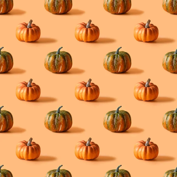 Seamless pattern of Thanksgiving day or Halloween pumpkin on orange background.