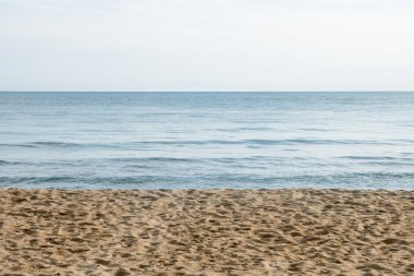 Deniz kum ve berrak gökyüzü doku