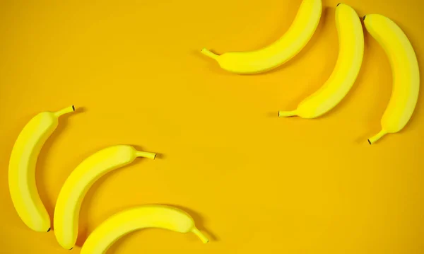 Plátanos Maduros Sobre Fondo Amarillo Frutas Dispersas Aleatoriamente Para Cartel — Foto de Stock