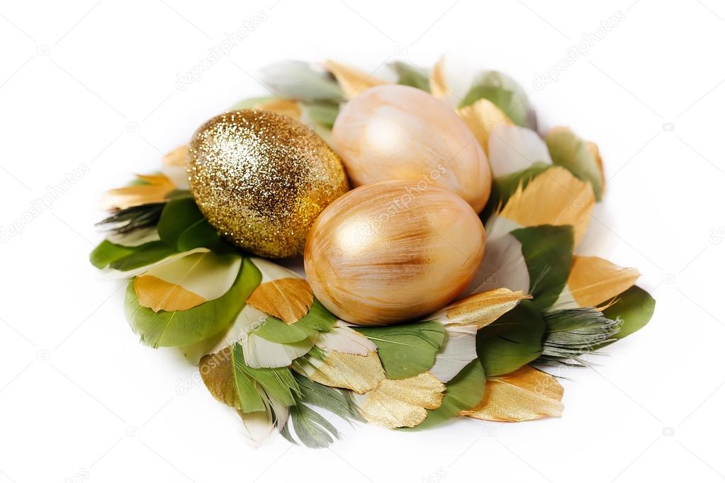 Easter golden eggs in a wreath