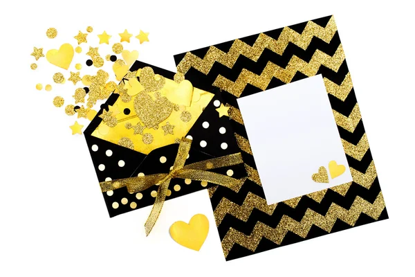 Open envelope with  gold hearts and a blank card on Chevron background — Stock Photo, Image