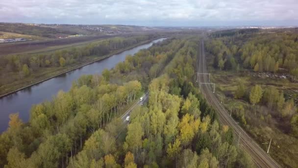 Воздушная осень River Railroad Road by drone — стоковое видео