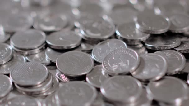 Many Brazilian coins scattered on the table — Stock Video