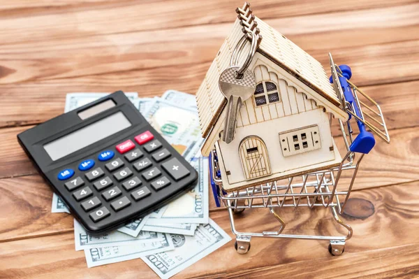 Carrinho Compras Com Modelo Casa Dinheiro Calculadora Mesa — Fotografia de Stock