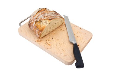 Ekmek kesme tahtası üzerinde yanındaki çelik bıçak