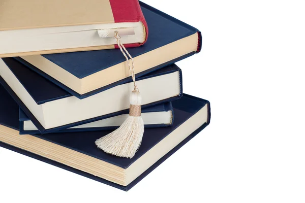 A stack of books and a bookmark — Stock Photo, Image