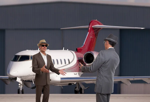 Two business men meeting at the executive airport — Stock Photo, Image