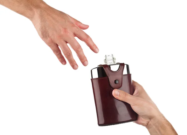 Hand reaching out for a drink — Stock Photo, Image