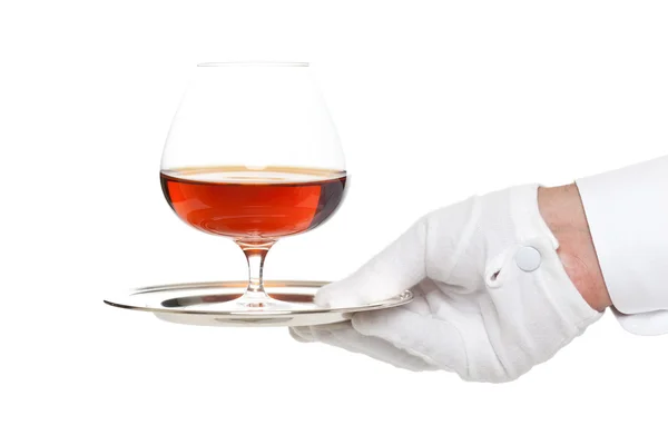 Maggiordomo che serve un bicchiere di liquore — Foto Stock