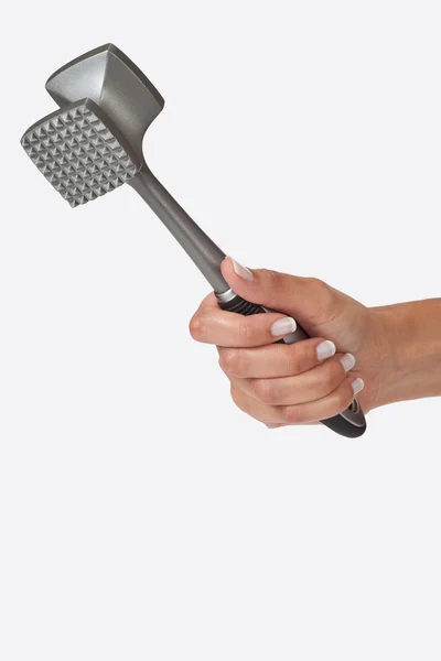 Hand holding a meat pounder — Stock Photo, Image