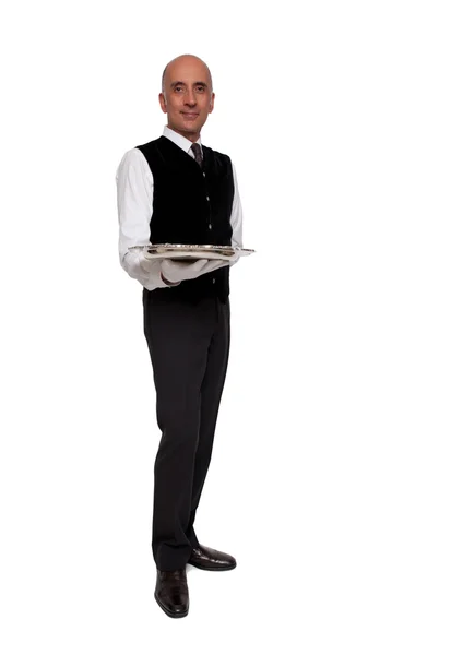 Waiter holding empty silver tray — Stock Photo, Image