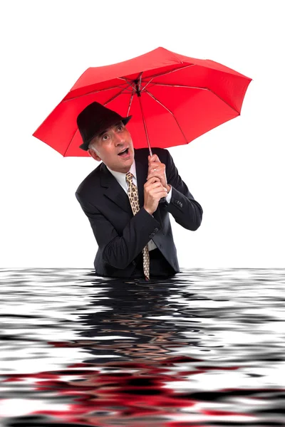 Uomo d'affari con ombrello ottenere allagato — Foto Stock