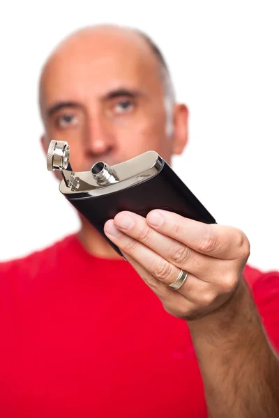 Homem segurando um frasco — Fotografia de Stock