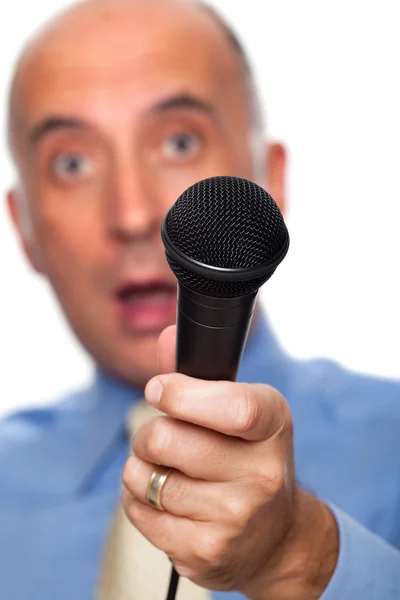 Microfoon gehouden door een verbaasd verslaggever — Stockfoto