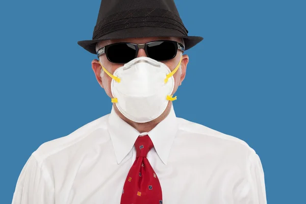Affärsman bära en skyddande mask — Stockfoto