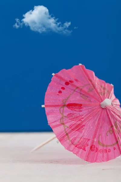 Ett papper rosa paraply — Stockfoto