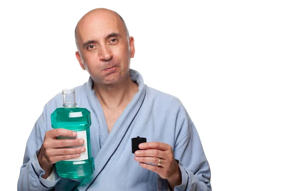 Man rinsing with mouthwash — Stock Photo, Image