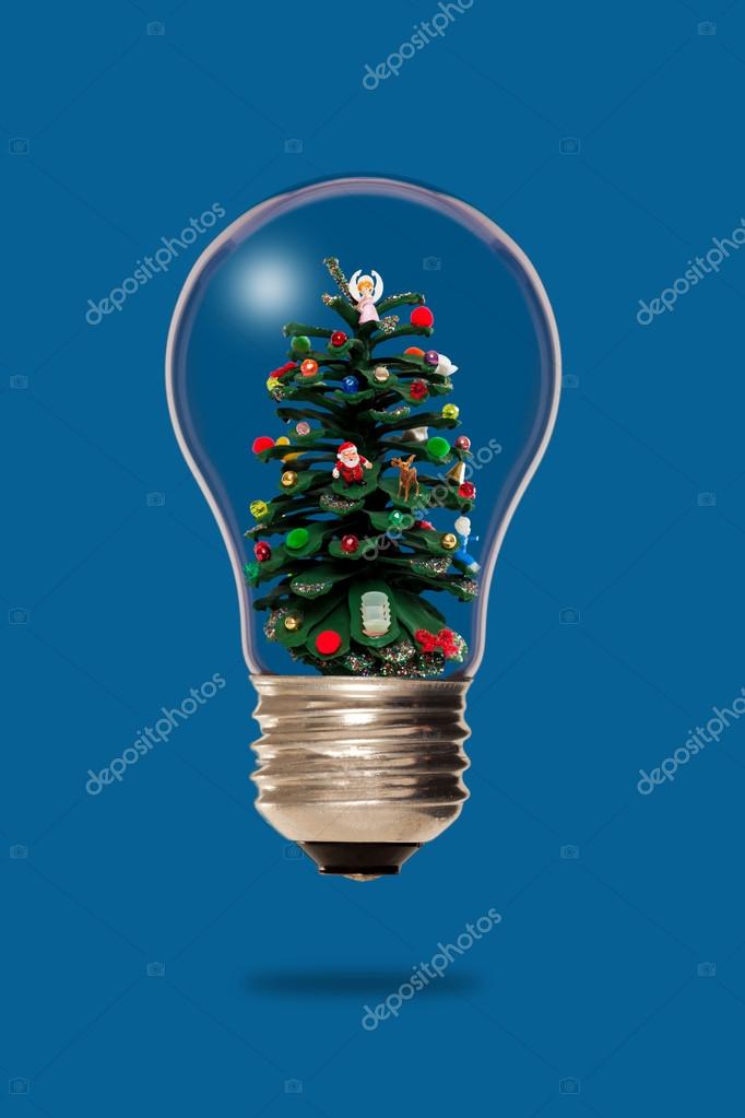Christmas tree inside bulb Photo by ©carlosyudica 91073638