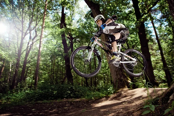 MOSCOW, RUSSIA - JUNE 20, 2016: Jump on a mountain bike.