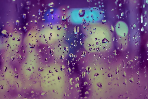 Абстрактный Круговой Боке Фон Ночного Света Капельками Дождя — стоковое фото