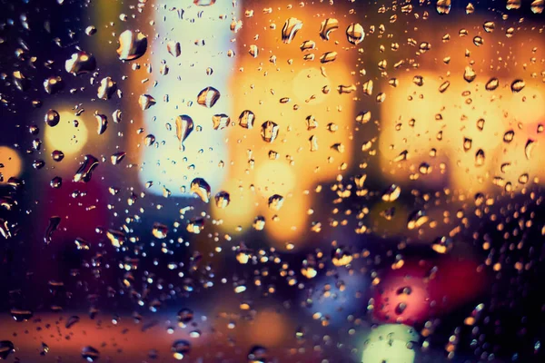 Абстрактный Круговой Боке Фон Ночного Света Капельками Дождя — стоковое фото