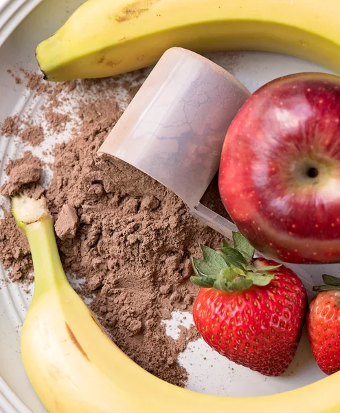 Tittar ner på plats för måltid ersättare pulver, apple, jord — Stockfoto