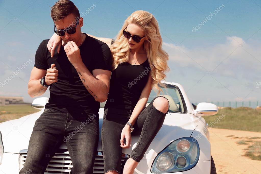 Romantic Couple In Love Embracing Near The Car. Beauty, Fashion. Love  Concept. Stock Photo, Picture and Royalty Free Image. Image 51797029.