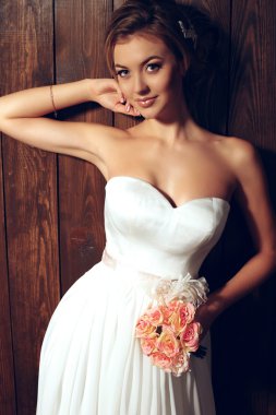beautiful tender bride in elegant lace wedding dress