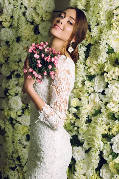 Beautiful tender bride in elegant lace wedding dress — Stok fotoğraf