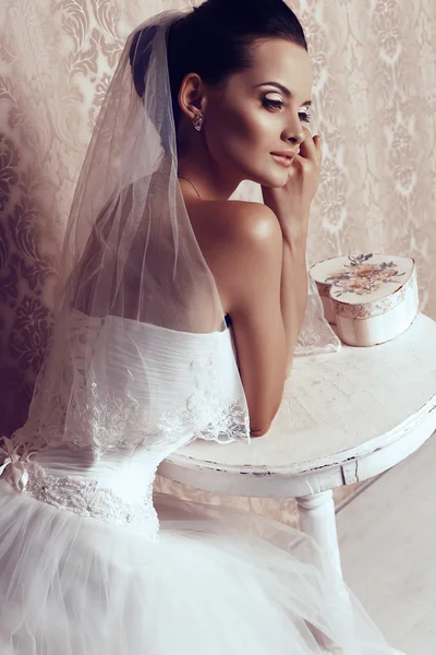 beautiful tender bride in elegant wedding dress