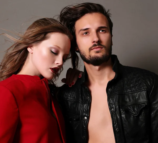 Fashion studio photo of beautiful sexy couple — Stock Photo, Image