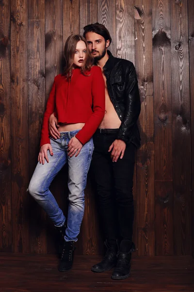Fashion studio photo of beautiful sexy couple — Stock Photo, Image