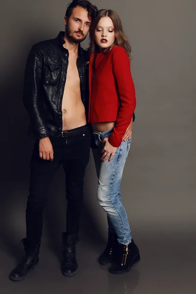 Fashion studio photo of beautiful sexy couple — Stock Photo, Image