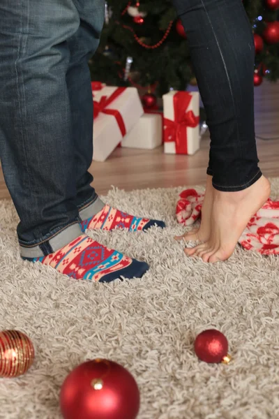 Legs of couple. Christmas details — 스톡 사진