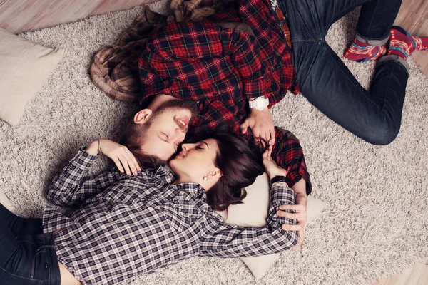 beautiful tender couple relaxing at home