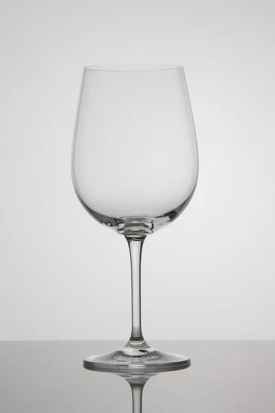 Empty glass of wine on white background — Stock Photo, Image