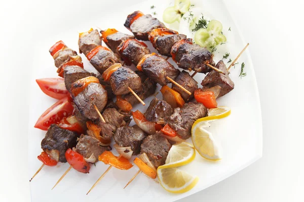 Grilled Juicy Skewered Shashlik on a Plate. — Stock Photo, Image