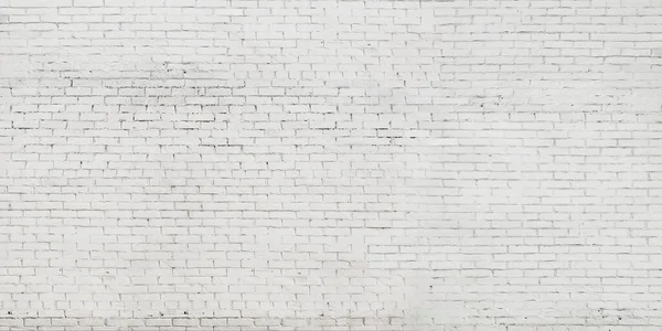Fundo de uma parede pintada de tijolo branco velho — Fotografia de Stock