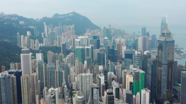 Luftaufnahme des Hafens von Victoria mit Stadtbild bei Tag, 4k, Hongkong