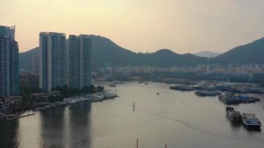 Aerial panorama of Sanya city at sunset time, 4k. Hainan island, China
