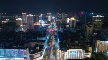 Aerial topdown view of Sanya riverside street traffic, Hainan island, China, 4k 