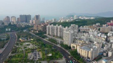 Aerial panorama of Sanya city at sunset time, 4k. Hainan island, China