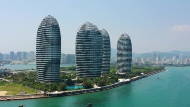 Aerial panorama of famous hotel complex at Sanya city, daytime, 4k. Hainan island, China