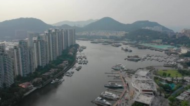 Aerial panorama of Sanya city at sunset time, 4k. Hainan island, China