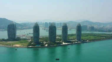 Aerial panorama of Sanya city at sunny day, 4k. Hainan island, China