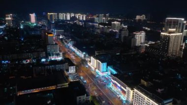 Aerial topdown view of Sanya riverside street traffic, Hainan island, China, 4k 