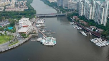 Aerial panorama of Sanya city at sunset time, 4k. Hainan island, China